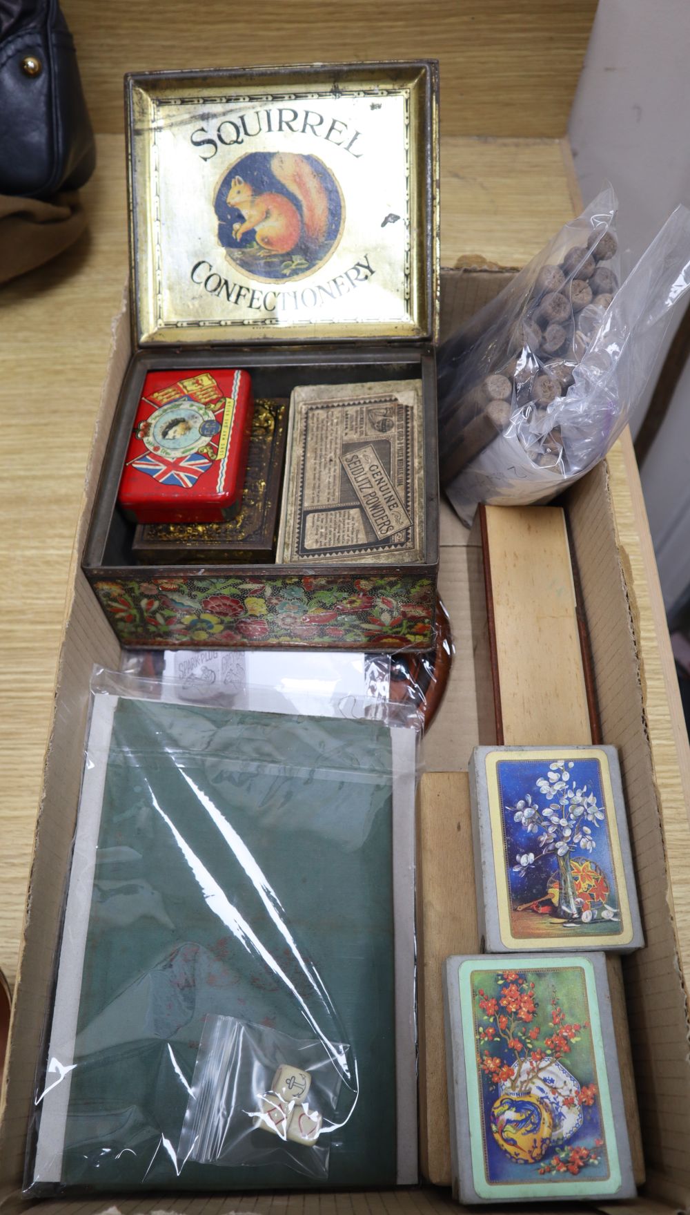 A collection of games including a solitaire board, cards, etc.